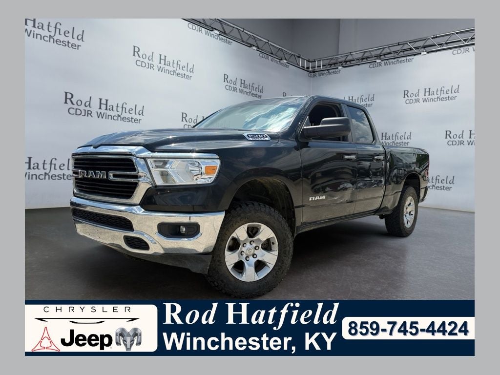 2020 RAM 1500 Big Horn Quad Cab 4x4 6'4' Box in Diamond Black Crystal Pearlcoat — front three-quarter view