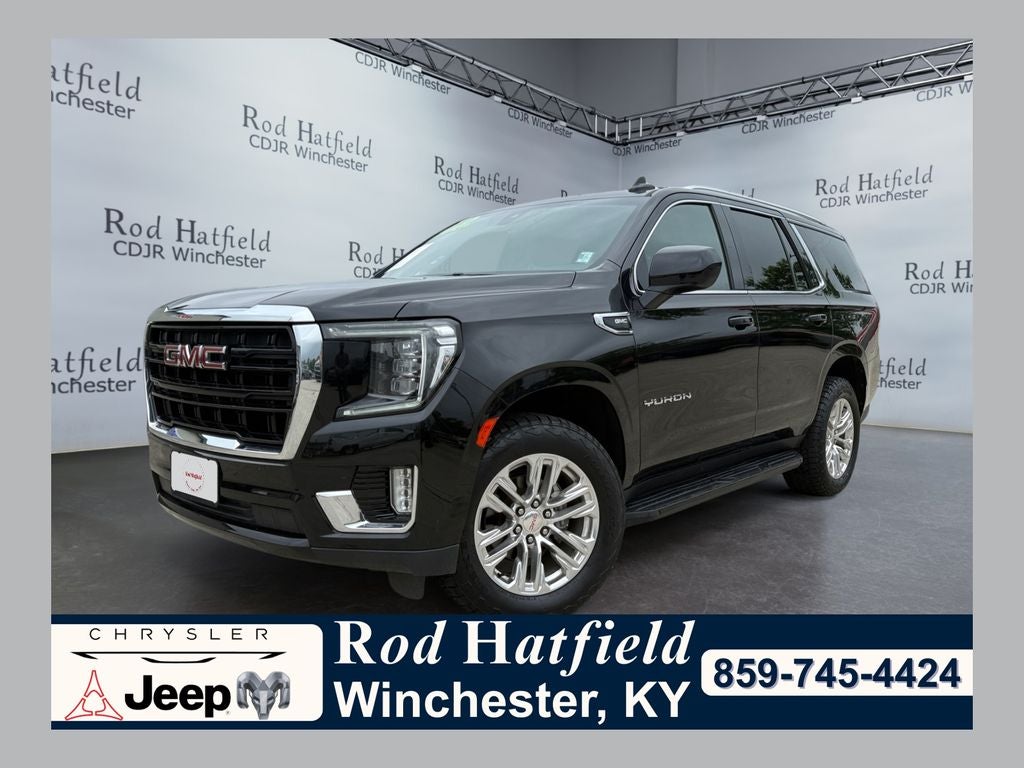 2021 GMC Yukon 4WD SLE in Onyx Black — front three-quarter view