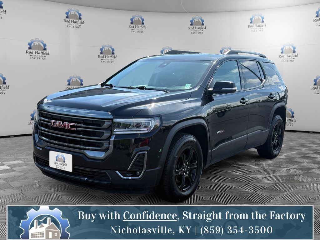 2023 GMC Acadia AT4 in Ebony Twilight Metallic — front three-quarter view
