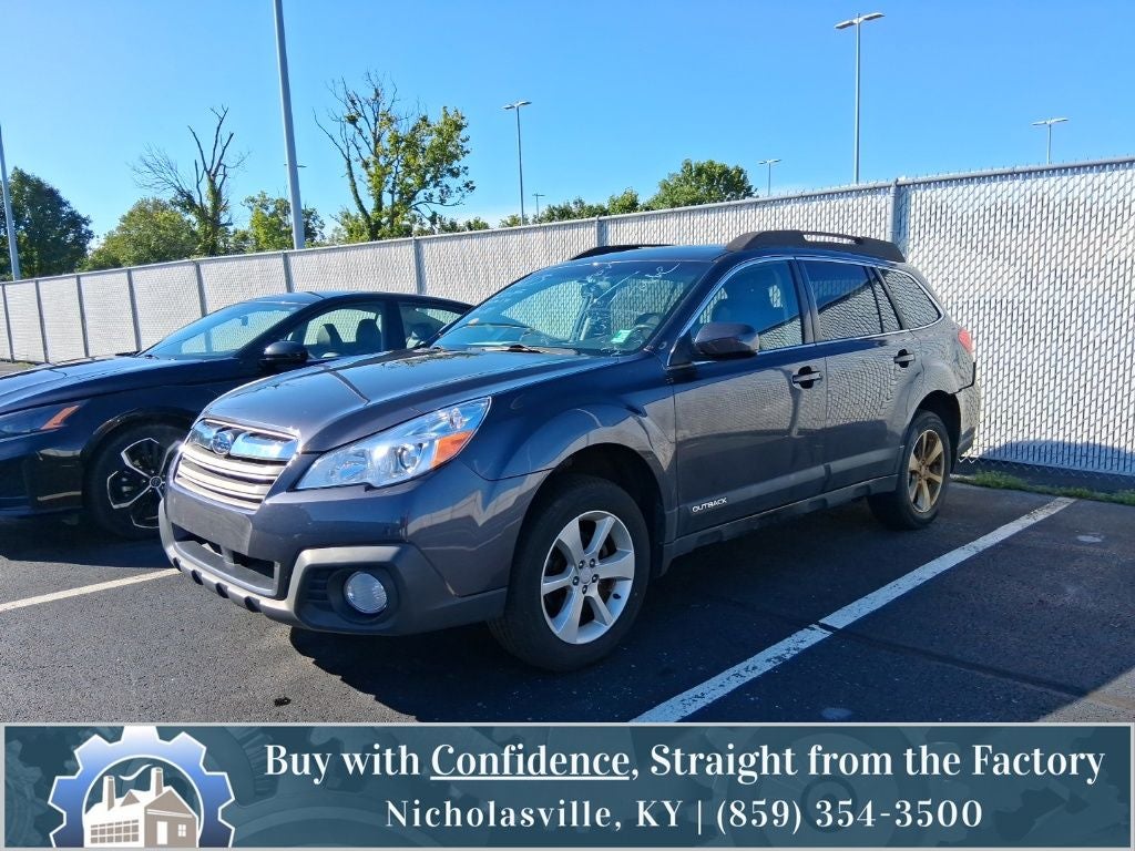 2013 Subaru Outback 2.5i Premium in Graphite Gray Metallic — front three-quarter view
