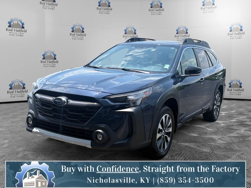2024 Subaru Outback Limited in Cosmic Blue — front three-quarter view