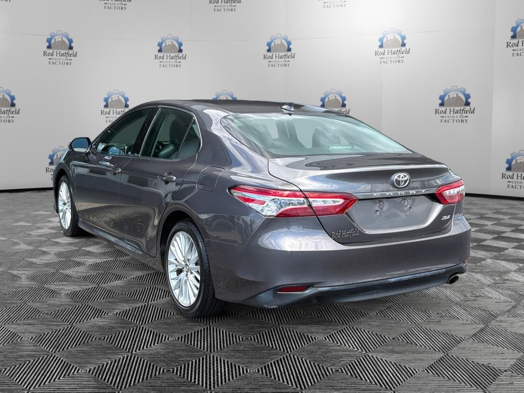 2019 Toyota Camry — rear three-quarter view