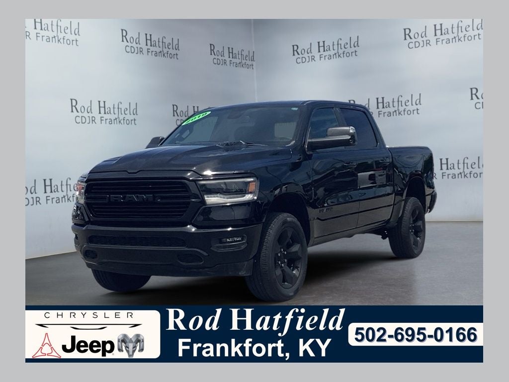 2019 RAM 1500 Rebel in Diamond Black Crystal Pearl — front three-quarter view