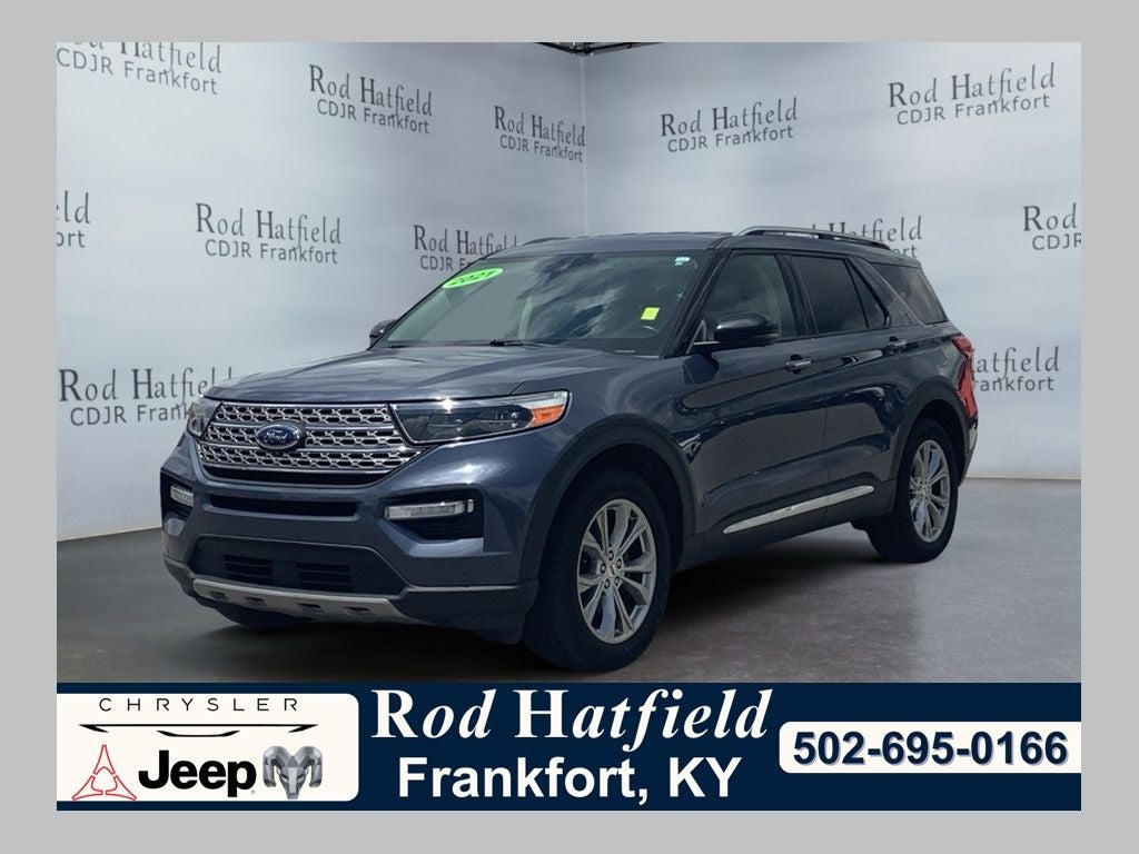2021 Ford Explorer Limited in Infinite Blue Metallic Tinted Clearcoat — front three-quarter view